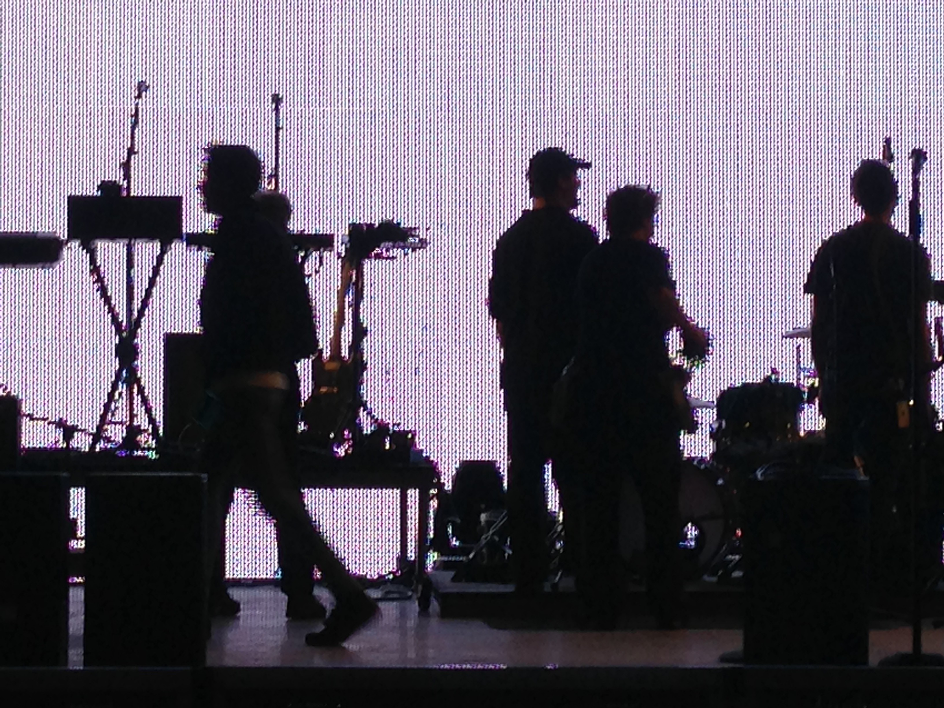 Local 251 stagehands working in front of the video wall at "The National" show.